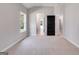 Spacious bedroom with carpet flooring and access to a private bathroom at 831 Banks Cir, Carrollton, GA 30116