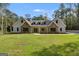 Two-story house with stone accents and a large front yard at 831 Banks Cir, Carrollton, GA 30116