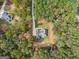 Aerial view of house and property; private wooded lot at 831 Banks Cir, Carrollton, GA 30116