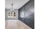 Dining room featuring a geometric dark gray accent wall at 831 Banks Cir, Carrollton, GA 30116