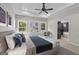 Main bedroom with a king bed, and ensuite bathroom access at 831 Banks Cir, Carrollton, GA 30116