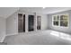 Spacious bedroom with walk-in closet and private bathroom access at 831 Banks Cir, Carrollton, GA 30116