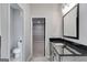Bathroom with walk-in shower, toilet, and modern vanity with granite countertop at 831 Banks Cir, Carrollton, GA 30116