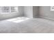 Bright bedroom with neutral carpeting and large windows at 831 Banks Cir, Carrollton, GA 30116