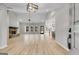 Open living room with high ceilings and stone fireplace at 831 Banks Cir, Carrollton, GA 30116