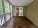 Screened porch with access to interior living space at 111 Fern Way, Canton, GA 30115