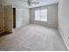 Bedroom with ceiling fan, window, and closet at 111 Fern Way, Canton, GA 30115