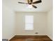 Simple bedroom with ceiling fan and window blinds at 3572 Stone Ridge Trl, Douglasville, GA 30134