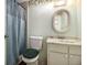 Clean bathroom with a shower, toilet, and vanity at 8608 Creekwood Way, Jonesboro, GA 30238