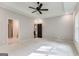 Large bedroom with plush carpeting and access to other rooms at 1797 Star Point Rd, Carrollton, GA 30116