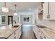 Open concept kitchen with a large island and stainless steel appliances at 1797 Star Point Rd, Carrollton, GA 30116