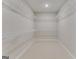 Large walk-in closet with wire shelving for ample storage at 1797 Star Point Rd, Carrollton, GA 30116