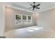 Spacious bedroom with ample natural light and carpet flooring at 1797 Star Point Rd, Carrollton, GA 30116