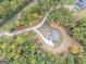 House nestled in a wooded area, accessible by a curving shared driveway at 1797 Star Point Rd, Carrollton, GA 30116