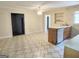 Kitchen with tiled floor, island, and built-in shelving at 1030 Mundys Mill Rd, Jonesboro, GA 30238