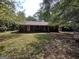 Brick ranch house with a covered porch at 1030 Mundys Mill Rd, Jonesboro, GA 30238