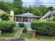 House exterior showcasing a screened porch and walkway at 988 Herndon Nw St, Atlanta, GA 30318
