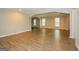 Spacious living room with hardwood floors and neutral walls at 1551 Adrian Dr, Riverdale, GA 30296