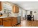 Kitchen with stainless steel appliances and breakfast nook at 3463 Madison Farm Way, Snellville, GA 30039
