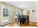 Bright dining area with French doors leading to backyard at 3463 Madison Farm Way, Snellville, GA 30039