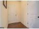 A view down a hallway with doors leading to other rooms at 445 Brickstone Way, Covington, GA 30016