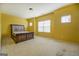 Spacious bedroom with large window and neutral walls at 445 Brickstone Way, Covington, GA 30016