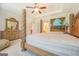 Main bedroom with large bed, dresser, and ensuite access at 445 Brickstone Way, Covington, GA 30016
