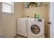 Laundry room with washer and dryer at 445 Brickstone Way, Covington, GA 30016
