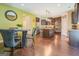 Modern kitchen with dark wood cabinets, granite counters, and stainless steel appliances at 445 Brickstone Way, Covington, GA 30016