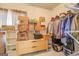 Walk-in closet with shelving and hanging rods at 445 Brickstone Way, Covington, GA 30016