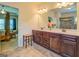 Double vanity bathroom with a large mirror and a shower at 445 Brickstone Way, Covington, GA 30016