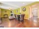 Open living room with hardwood floors and gas fireplace at 445 Brickstone Way, Covington, GA 30016