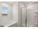 Bathroom featuring a shower and garden tub at 512 Whitman Lane # 2004, Stockbridge, GA 30281