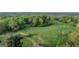 Wooded acreage with open field and distant views at 5325 Browns Bridge Rd, Cumming, GA 30041
