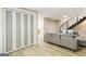 Finished basement with ample storage and a modern staircase at 1510 Mims Sw St, Atlanta, GA 30314