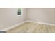 Bright basement bedroom with wood-look flooring at 1510 Mims Sw St, Atlanta, GA 30314