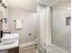 Basement bathroom with tub shower combo and modern vanity at 1510 Mims Sw St, Atlanta, GA 30314