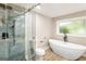 Modern bathroom with walk-in shower and soaking tub at 1510 Mims Sw St, Atlanta, GA 30314