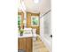 Stylish bathroom featuring a soaking tub and double vanity at 1510 Mims Sw St, Atlanta, GA 30314