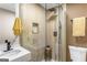 Modern bathroom with a walk-in shower and marble vanity at 1510 Mims Sw St, Atlanta, GA 30314