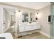Double vanity bathroom with modern fixtures and lighting at 1510 Mims Sw St, Atlanta, GA 30314