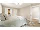 Cozy bedroom with a queen bed and private bathroom access at 1510 Mims Sw St, Atlanta, GA 30314