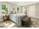 Bright bedroom with a queen-size bed and ensuite bathroom at 1510 Mims Sw St, Atlanta, GA 30314