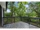 Deck overlooking a lush, wooded backyard at 1510 Mims Sw St, Atlanta, GA 30314