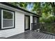 Charming deck with black railings, offering a view of the backyard at 1510 Mims Sw St, Atlanta, GA 30314