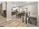 Open dining area with a view of the kitchen and staircase at 1510 Mims Sw St, Atlanta, GA 30314