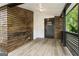 Modern front porch with wood siding and flooring at 1510 Mims Sw St, Atlanta, GA 30314