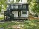 Modern two-story home with a deck and stairs at 1510 Mims Sw St, Atlanta, GA 30314