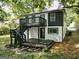 Modern two-story home with a deck and stairs at 1510 Mims Sw St, Atlanta, GA 30314