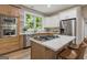 Modern kitchen with stainless steel appliances and an island at 1510 Mims Sw St, Atlanta, GA 30314